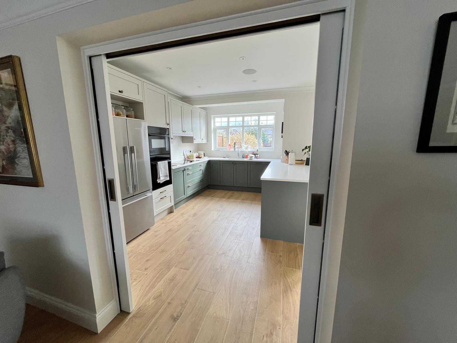 Open-plan living space created through home renovation by MLH Construction in Ruislip
